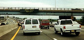 Heavy merge electric sign