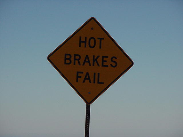 Hot brakes fail sign (dark exposure)