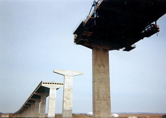 View of empty pier with completed spans on either side
