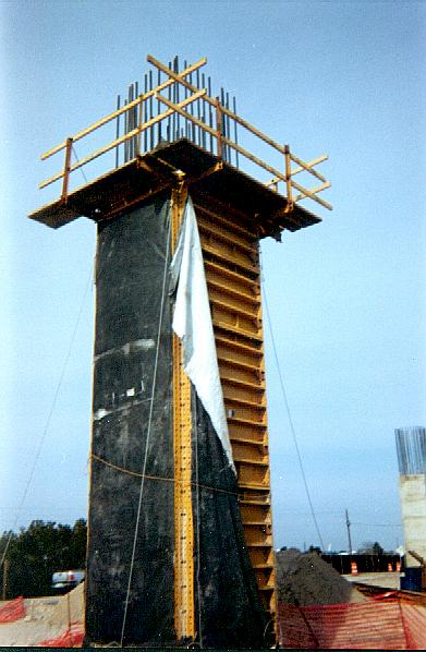 Forms for pier on south mainland with black sheathing peeled back