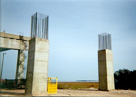 Dual poured pier bases with rebars sticking up on south mainland