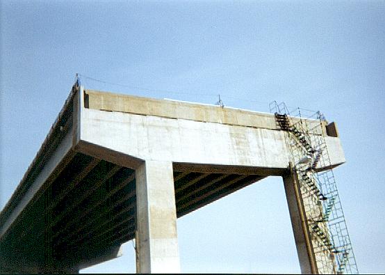 End of slab with scaffold ladder from ground to top