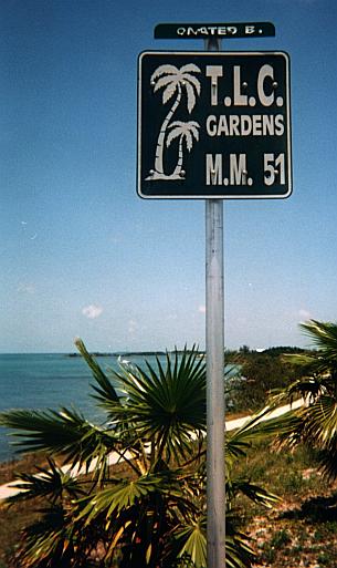 T.L.C. Gardens sign
